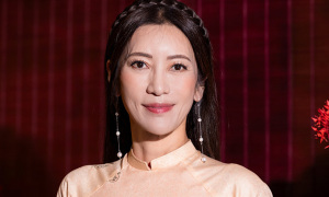 US ambassador's wife walks in ao dai show held by Miss Vietnam